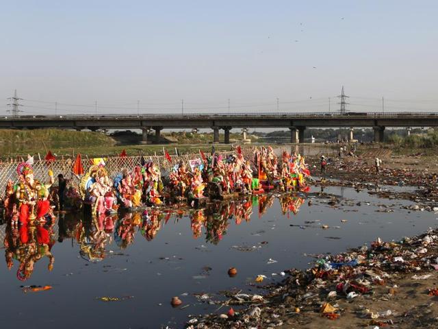 A view of even more polluted Yamuna river after immersion of Ganesh idols on Ganesh Chaturdashi, in New Delhi on Monday. (Ravi Choudhary/ Hindustan Times)