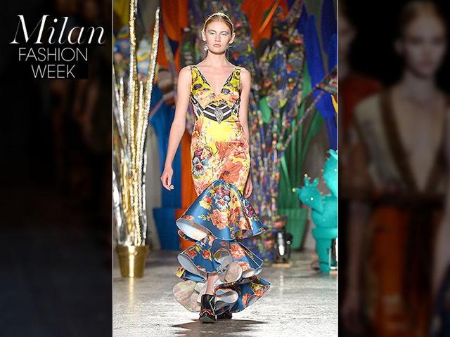 Leitmotiv: The show was a catwalk party with a bright and colorful collection decorated with vibrant and graphic motifs. Frills were a collection staple. Leitmotiv: The show was a catwalk party with a bright and colorful collection decorated with vibrant and graphic motifs. Frills were a collection staple.