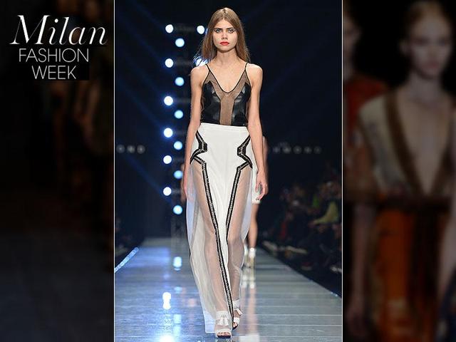 John Richmond: The designer went for a sexy attitude vibe with thigh-high split dresses both long and short and transparent fabrics at the front and the back. John Richmond: The designer went for a sexy attitude vibe with thigh-high split dresses both long and short and transparent fabrics at the front and the back.