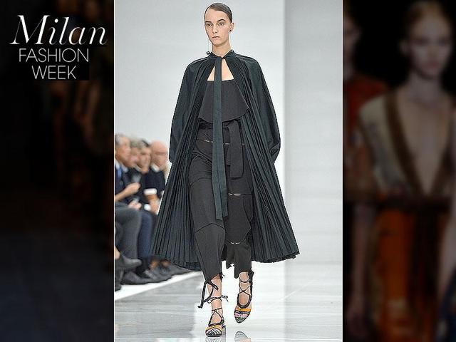 Salvatore Ferragamo: Stripes were a staple that presented a much more classic yet refined collection. Dresses are long and fluid and some are embellished with frills. Salvatore Ferragamo: Stripes were a staple that presented a much more classic yet refined collection. Dresses are long and fluid and some are embellished with frills.