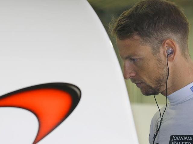 McLaren driver Jenson Button of Britain watches a monitor during the second practice session for the Japanese Grand Prix in Suzuka, Japan on September 25, 2015. (AP) McLaren driver Jenson Button of Britain watches a monitor during the second practice session for the Japanese Grand Prix in Suzuka, Japan on September 25, 2015. (AP)