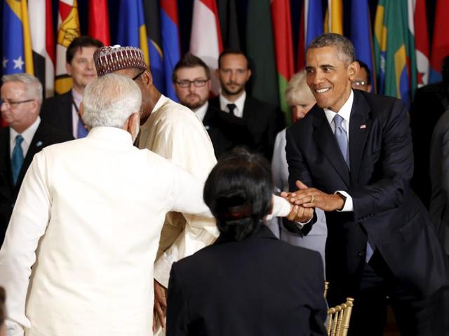 US President Barack Obama and Indian Prime Minister Narendra Modi shake hands during the luncheon at the United Nations General Assembly in New York. (REUTERS) US President Barack Obama and Indian Prime Minister Narendra Modi shake hands during the luncheon at the United Nations General Assembly in New York. (REUTERS)