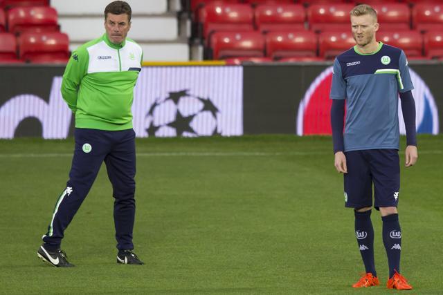 VfL Wolfsburg head coach Dieter Hecking, left, watches as his players including Andre Shurrle, right, train at Old Trafford, Manchester, on September 29, 2015. (AP Photo) VfL Wolfsburg head coach Dieter Hecking, left, watches as his players including Andre Shurrle, right, train at Old Trafford, Manchester, on September 29, 2015. (AP Photo)