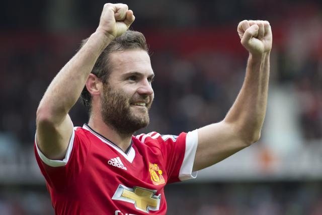 Juan Mata celebrates after scoring the third goal against Sunderland. (AP Photo)