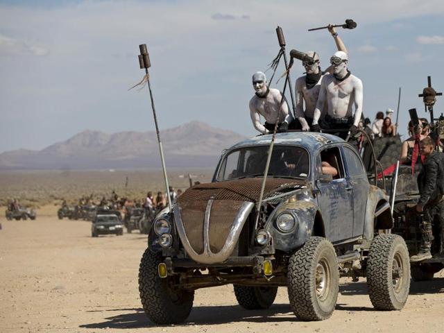 Enthusiasts ride their customized vehicles during the Wasteland Weekend event in California City, California September 26, 2015. The four-day event has a post-apocalyptic theme and is inspired by the Mad Max movie franchise. (REUTERS)