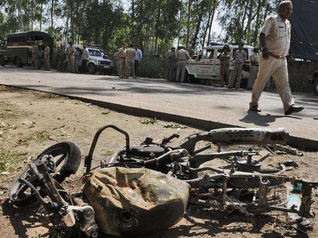 A man was killed and his son critically injured by a mob over an allegation of cow-slaughter, in Bisada village, Greater Noida. Police and PAC were immediately deployed in the village to maintain law and order.(Burhaan Kinu / HT Photo)