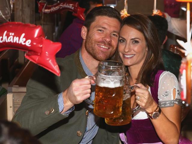 FC Bayern Munich's Xabi Alonso and wife Nagore Aramburu at the customary visit of the football club to the Oktoberfest festivites in Munich, Germany. (EPA Photo)
