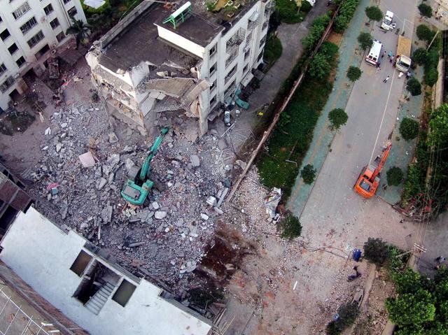 A damaged building is seen a day after a series of blasts in Liucheng county in Liuzhou. (AFP) A damaged building is seen a day after a series of blasts in Liucheng county in Liuzhou. (AFP)