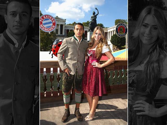 Spanish footballer Thiago of FC Bayern Munich and his partner Julia Vigas pose during their visit at the Oktoberfest in Munich, Germany. (Reuters Photo)