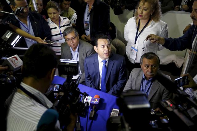 Jimmy Morales addresses the media at the media center of the Supreme Electoral Tribunal (TSE) in Guatemala City. Running on an anti-corruption ticket, Morales rode a wave of public anger over a multi-million dollar customs scandal that led to the arrest of President Otto Perez last month, and he won the first round of voting on Sept 6. (Picture taken on September 6, 2015) (REUTERS) Jimmy Morales addresses the media at the media center of the Supreme Electoral Tribunal (TSE) in Guatemala City. Running on an anti-corruption ticket, Morales rode a wave of public anger over a multi-million dollar customs scandal that led to the arrest of President Otto Perez last month, and he won the first round of voting on Sept 6. (Picture taken on September 6, 2015) (REUTERS)