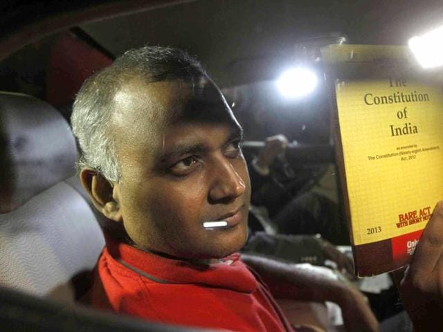 AAP MLA Somnath Bharti shows a book of Constitution of India as he arrives to surrender at the Dwarka North Police Station, in New Delhi, India, on Monday, September 28, 2015. (Virendra Singh/HT) AAP MLA Somnath Bharti shows a book of Constitution of India as he arrives to surrender at the Dwarka North Police Station, in New Delhi, India, on Monday, September 28, 2015. (Virendra Singh/HT)
