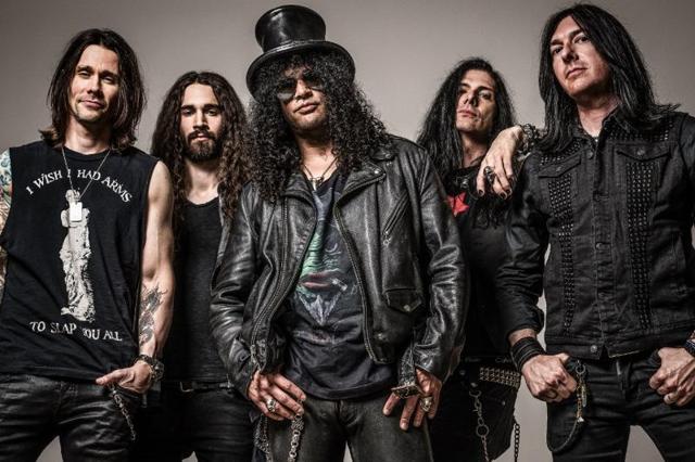Slash (centre) ft Miles Kennedy and The Conspirators Slash (centre) ft Miles Kennedy and The Conspirators