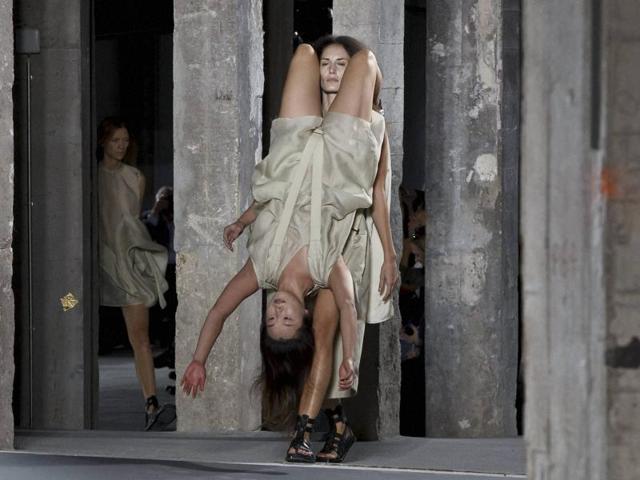Models as backpacks and knapsacks: When American designer Rick Owens showcased his creations at the Paris Fashion Week, the strapped up models left the audience shocked. (AP) Models as backpacks and knapsacks: When American designer Rick Owens showcased his creations at the Paris Fashion Week, the strapped up models left the audience shocked. (AP)