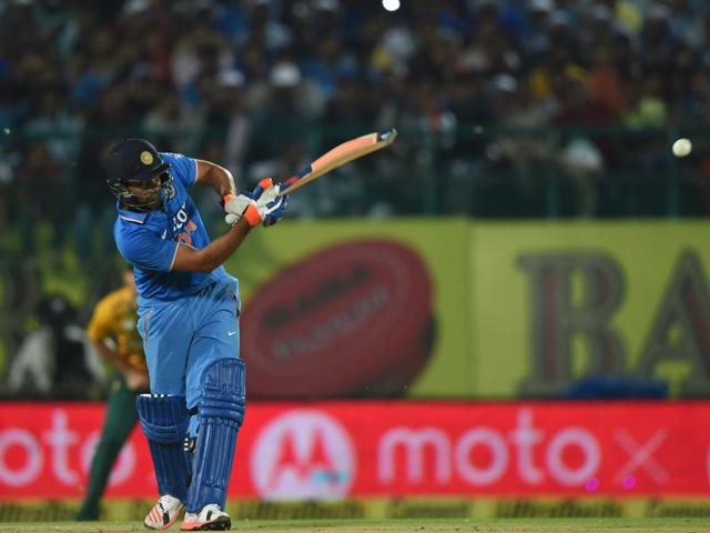 India's Rohit Sharma plays a shot during the first innings. Rohit’s knock of 106, his first century in Twenty20 internationals, helped India to a total of 199. (AFP Photo)
