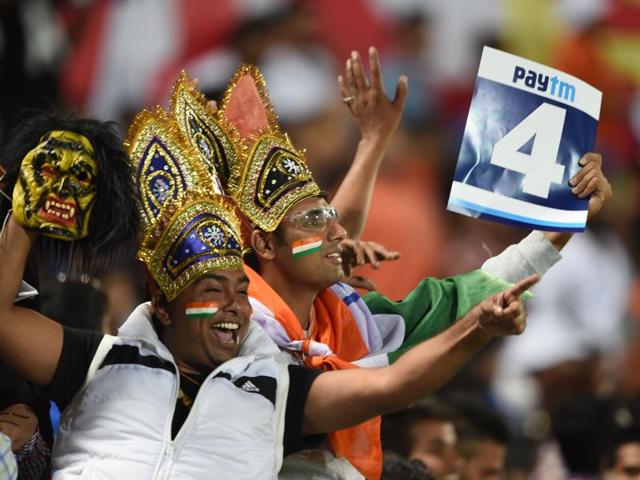 Indian supporters cheer the team on ahead of the start of the match. (AFP Photo)