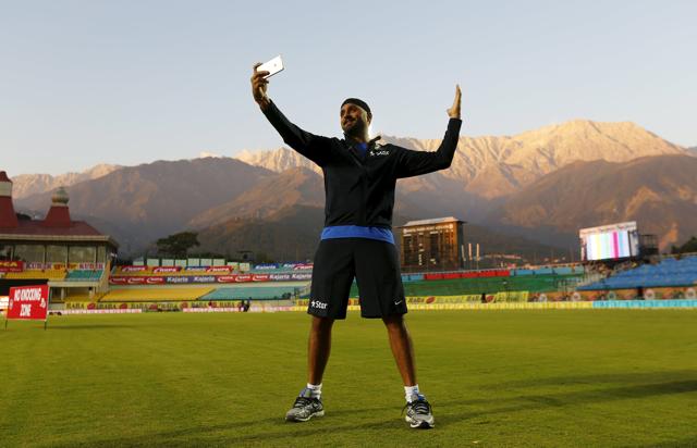 India’ss Harbhajan Singh takes a selfie during a practice session ahead of their first Twenty-20 cricket match against South Africa. (REUTERS) India’ss Harbhajan Singh takes a selfie during a practice session ahead of their first Twenty-20 cricket match against South Africa. (REUTERS)