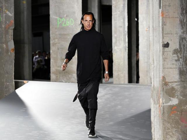 US fashion designer Rick Owens acknowledges the audience at the end of his 2016 Spring/Summer ready-to-wear collection fashion show. (AFP) US fashion designer Rick Owens acknowledges the audience at the end of his 2016 Spring/Summer ready-to-wear collection fashion show. (AFP)