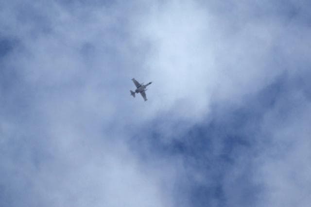 A warplane which activists say belongs to the Russian forces flies in the sky over the southern countryside of Idlib. (REUTERS) A warplane which activists say belongs to the Russian forces flies in the sky over the southern countryside of Idlib. (REUTERS)