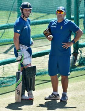 South African batsman AB de Villiers with team coach Russell Domingo during a practice session ahead of their first T20 match against India in Dharamsala. (PTI) South African batsman AB de Villiers with team coach Russell Domingo during a practice session ahead of their first T20 match against India in Dharamsala. (PTI)