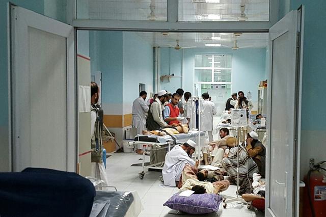 In this undated photograph released by Medecins Sans Frontieres (MSF) on October 3, 2015, Afghan MSF medical personnel treat civilians injured following an offensive against Taliban militants by Afghan and coalition forces at the MSF hospital in Kunduz. (AFP Photo) In this undated photograph released by Medecins Sans Frontieres (MSF) on October 3, 2015, Afghan MSF medical personnel treat civilians injured following an offensive against Taliban militants by Afghan and coalition forces at the MSF hospital in Kunduz. (AFP Photo)