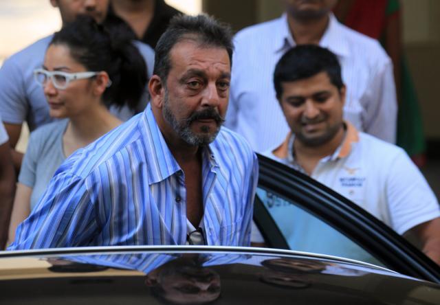 Bollywood actor Sanjay Dutt with his wife Manyata as he leaves his residence to return to jail after Yerwada Prison authorities rejected his plea for the extension of his furlough, in Mumbai, India, on Saturday, January 10, 2015. (Hindustan Times) Bollywood actor Sanjay Dutt with his wife Manyata as he leaves his residence to return to jail after Yerwada Prison authorities rejected his plea for the extension of his furlough, in Mumbai, India, on Saturday, January 10, 2015. (Hindustan Times)