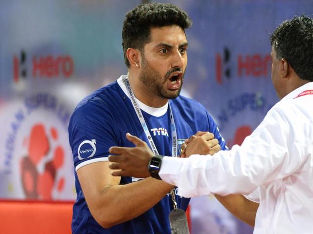 Owner of Chennaiyin FC Abhishek Bachchan cheers his team during the Indian Super League 2015 football match between Chennaiyin FC and Atletico-de-Kolkata in Chennai on October 3, 2015. (AFP PHOTO)