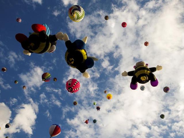 The nine-day event kicked off at dawn . More than 500 balloons representing dozens of states and nearly 20 different countries registered for the event this year. (REUTERS)