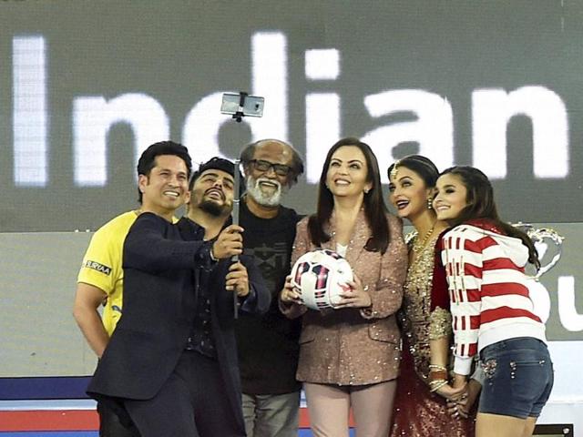 Selfie time! Cricketer Sachin Tendulkar, Neeta Ambani, Bollyoood actors Aishwarya Rai Bachchan, Arjun Kapoor and Alia Bhatt pose for a selfie with Tamil superstar Rajinikanth during the opening ceremony of ISL2015 in Chennai on October 3. (PTI phOTO)