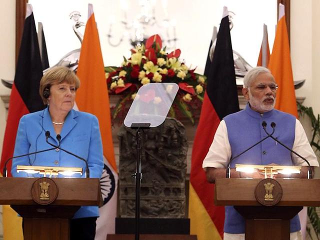 German Chancellor Angela Merkel, left, and Indian Prime Minister Narendra Modi address the media in New Delhi. (Reuters) German Chancellor Angela Merkel, left, and Indian Prime Minister Narendra Modi address the media in New Delhi. (Reuters)