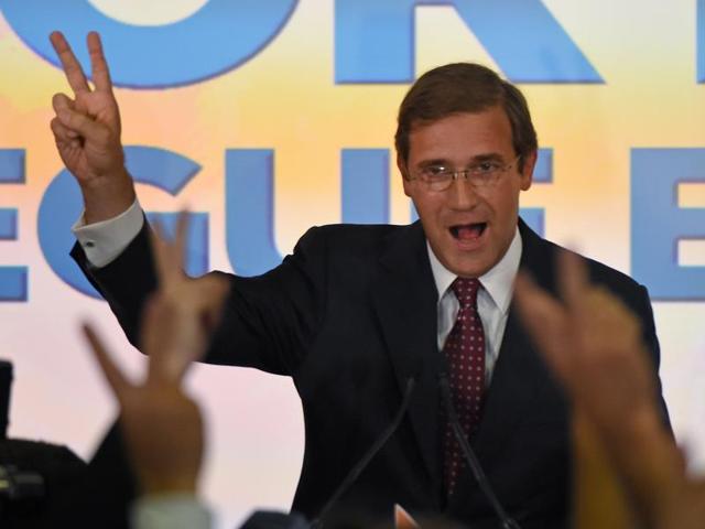 Social Democratic Party leader and Prime Minister Pedro Passos Coelho celebrates with supporters in Lisbon after winning the general elections on October 4, 2015. (AFP) Social Democratic Party leader and Prime Minister Pedro Passos Coelho celebrates with supporters in Lisbon after winning the general elections on October 4, 2015. (AFP)