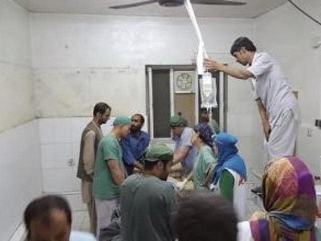 Afghan (MSF) surgeons work inside a Medecins Sans Frontieres (MSF) hospital after an air strike in the city of Kunduz, Afghanistan. (Medecins Sans Frontieres/Handout via Reuters) Afghan (MSF) surgeons work inside a Medecins Sans Frontieres (MSF) hospital after an air strike in the city of Kunduz, Afghanistan. (Medecins Sans Frontieres/Handout via Reuters)