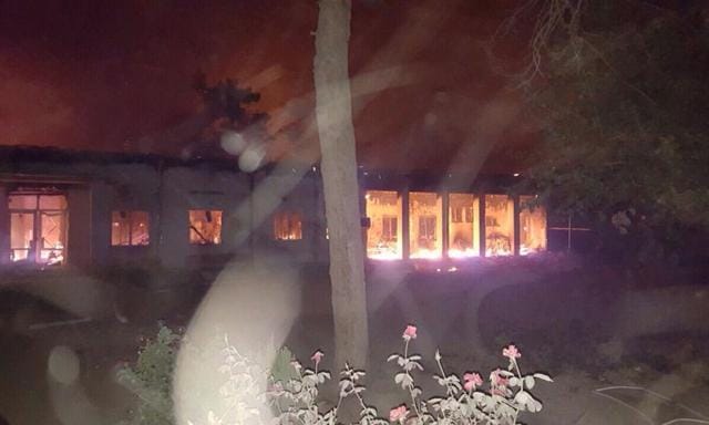 The Doctors Without Borders hospital is seen in flames, after explosions in the northern Afghan city of Kunduz on Saturday. (AP)