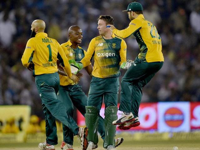 South African players celebrate the dismissal of Kohli during the first innings. (PTI Photo)