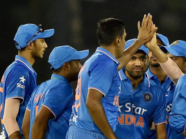 Indian bowler Ravichandran Ashwin, centre, is greeted by teammates after his dismissal of South African batsman Hashim Amla during the second innings. (PTI Photo)