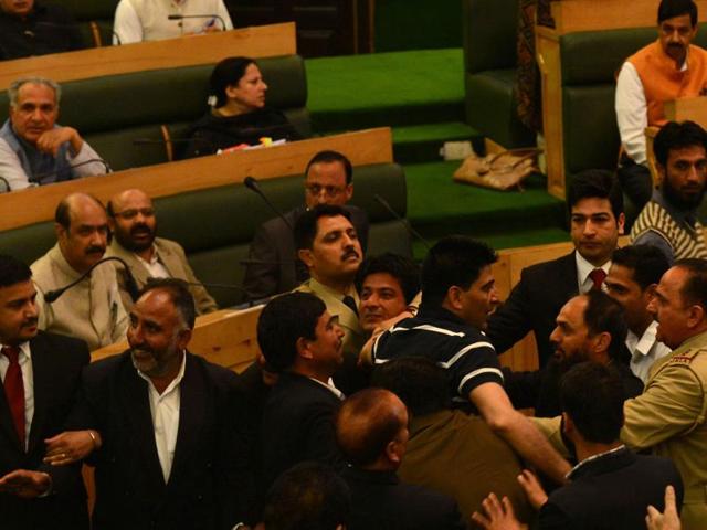 Jammu and Kashmir assembly was adjourned amid ruckus on Monday after speaker Kavinder Gupta disallowed the discussion on beef ban. (Waseem Andrabi/HT )
