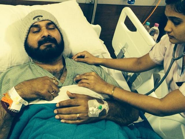 Former cricketer and Amritsar MP Navjot Singh Sidhu in a New Delhi hospital following a clot in his leg. Former cricketer and Amritsar MP Navjot Singh Sidhu in a New Delhi hospital following a clot in his leg.