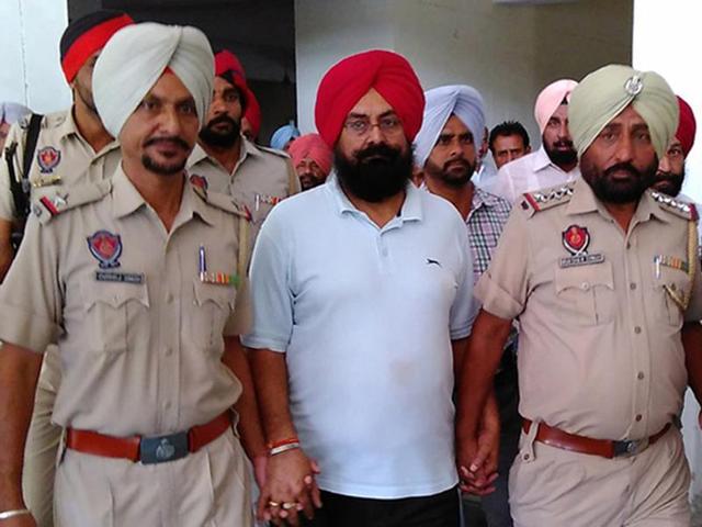 Mangal Singh Sandhu, suspended director, agriculture, in custody in a Talwandi Sabo court in Bathinda on Monday. (Sanjeev Kumar/HT) Mangal Singh Sandhu, suspended director, agriculture, in custody in a Talwandi Sabo court in Bathinda on Monday. (Sanjeev Kumar/HT)