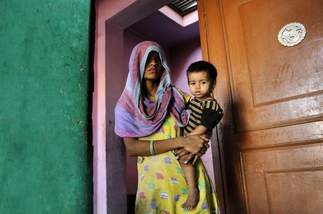 Wife and son of Hariom, one of the accused in Mohmammad Ikhlaq's killing in Dadri. (Burhaan Kinu /HT Photo) Wife and son of Hariom, one of the accused in Mohmammad Ikhlaq's killing in Dadri. (Burhaan Kinu /HT Photo)