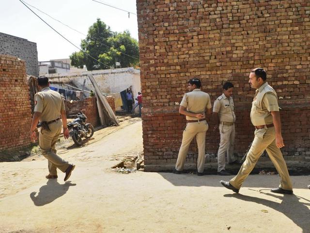 A police team patrols outside the Ikhlaq’s house who was killed by a mob over an allegation of cow slaughtering late night on September 28, at Bisada village, in Greater Noida. (Burhaan Kinu / HT Photo) A police team patrols outside the Ikhlaq’s house who was killed by a mob over an allegation of cow slaughtering late night on September 28, at Bisada village, in Greater Noida. (Burhaan Kinu / HT Photo)