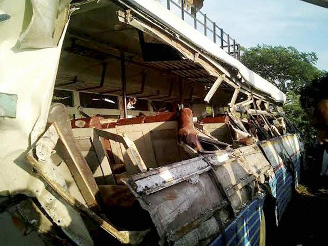 The damaged bus that collided with lorry in Ramannapeta of Nalgonda district on Wednesday. (PTI)