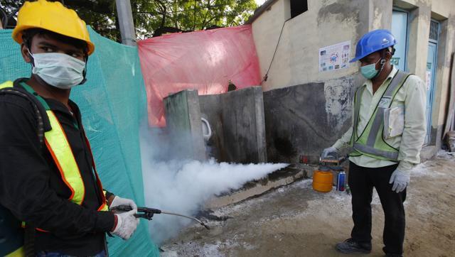 Fumigation in progress after Delhi Lieutenant Governor Najeeb Jung visited Delhi Metro construction sites at Delhi Gate to inspect measures taken by authorities to contain the spread of dengue in New Delhi. (Hindustan Times) Fumigation in progress after Delhi Lieutenant Governor Najeeb Jung visited Delhi Metro construction sites at Delhi Gate to inspect measures taken by authorities to contain the spread of dengue in New Delhi. (Hindustan Times)