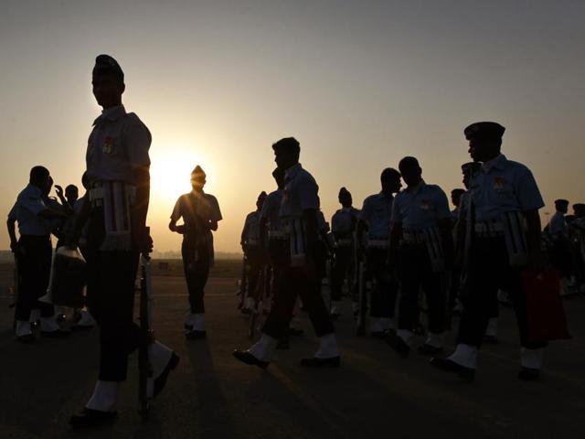 Indian Air Force personnel march past during full dress rehearsal conducted early morning, ahead of the Air Force Day parade at the Hindon Air Force Station in Ghaziabad. (Raj K Raj/ HT Photo)