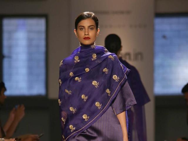 A model showcasing intrigue embroidery creations by fashion designer Sanjay Garg. (IANS) A model showcasing intrigue embroidery creations by fashion designer Sanjay Garg. (IANS)