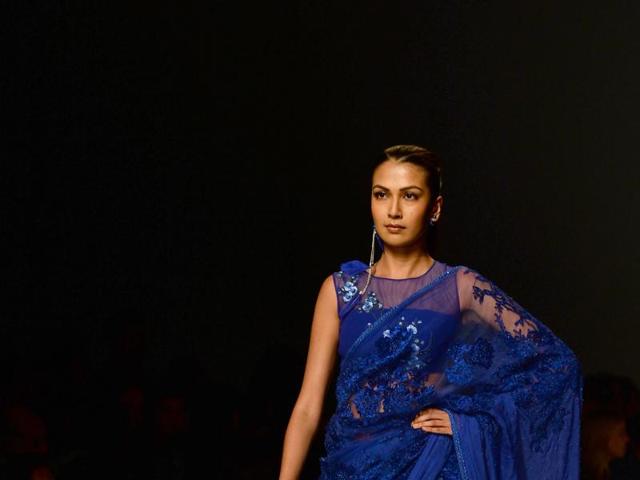 Net saree embroidered with sequins by Indian fashion designers Rabani and Rakha. (AFP) Net saree embroidered with sequins by Indian fashion designers Rabani and Rakha. (AFP)