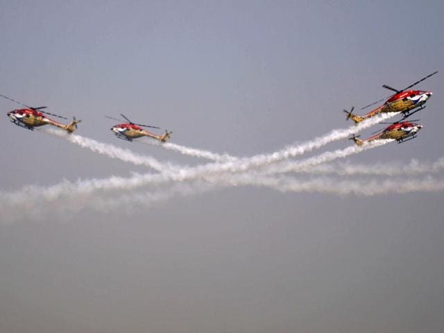 Advanced Light Helicopters (ALH) of the Indian Air Force's ‘Sarang’ aerobatics team perform during the full dress rehearsal, ahead of 83rd Air Force day on October 8, at Hindon airbase, in Ghaziabad. (Sakib Ali / HT Photo)
