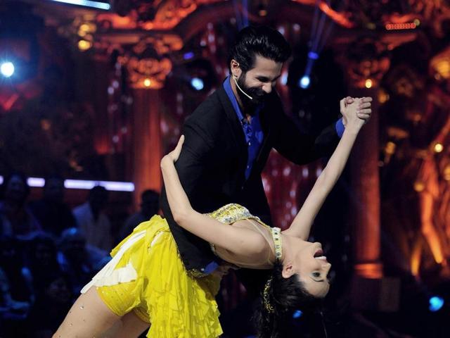 Shahid Kapoor performs with Sanaya Irani during the Super Finale of Jhalak Dikhhla Jaa Reloaded on the set in Mumbai on Wednesday night. (AFP)