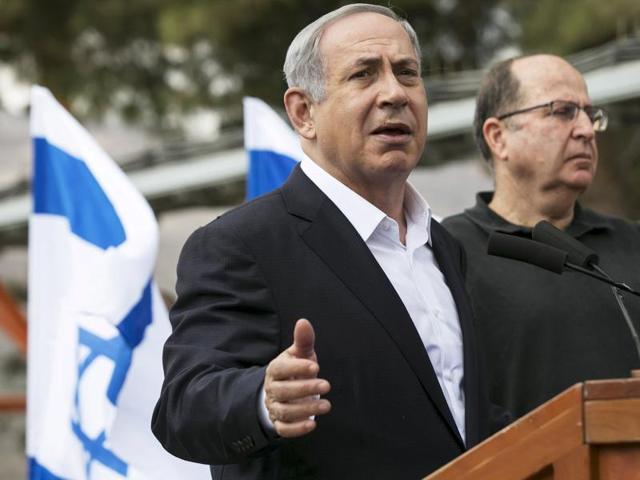 Israeli Prime Minister Benjamin Netanyahu (L) speaks to the media after attending a meeting in an army base near the West Bank city of Nablus. Palestinian President Mahmoud Abbas said on Tuesday he did not want a spike in deadly violence in east Jerusalem and the Israeli-occupied West Bank to spiral into armed confrontation with Israel. (Reuters Photo) Israeli Prime Minister Benjamin Netanyahu (L) speaks to the media after attending a meeting in an army base near the West Bank city of Nablus. Palestinian President Mahmoud Abbas said on Tuesday he did not want a spike in deadly violence in east Jerusalem and the Israeli-occupied West Bank to spiral into armed confrontation with Israel. (Reuters Photo)