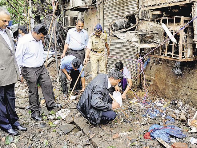 Forensic experts at the scene of the 2011 Mumbai blasts. (File Photo) Forensic experts at the scene of the 2011 Mumbai blasts. (File Photo)