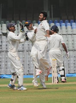 Shardul Thakur of Mumbai celebrates with teammates after picking up a wicket against Punjab at Wankhede Stadium in Mumbai on Thursday. (Prakash Parsekar)
