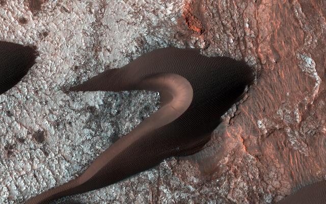 This image released by Nasa shows Martian sand dunes. Images like this provide information about erosion and movement of surface material, about wind and weather patterns, even about the soil grains and grain sizes. (AFP Photo) This image released by Nasa shows Martian sand dunes. Images like this provide information about erosion and movement of surface material, about wind and weather patterns, even about the soil grains and grain sizes. (AFP Photo)